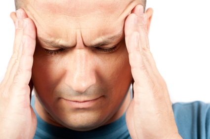 Man in need of headache treatment in DeLand