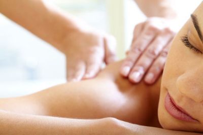 Woman receiving massage therapy in DeLand